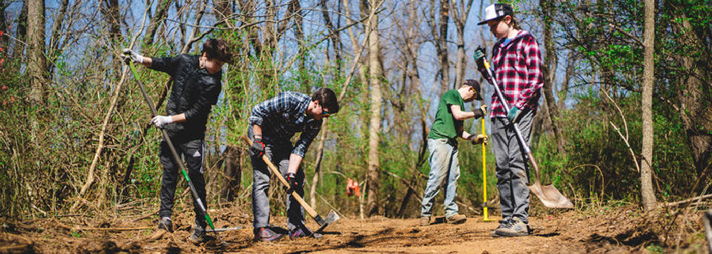 Volunteers, students, trail building, shovels, rakes 
