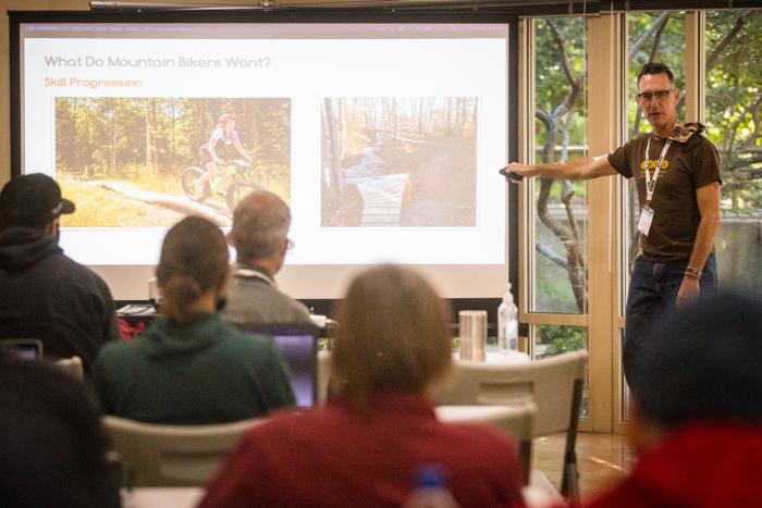 "IMBA staff presents to Trail Labs attendees on skill progression on local trails"