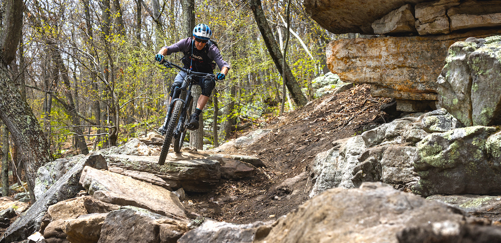 Person riding mountain bike in Cacapon State Park