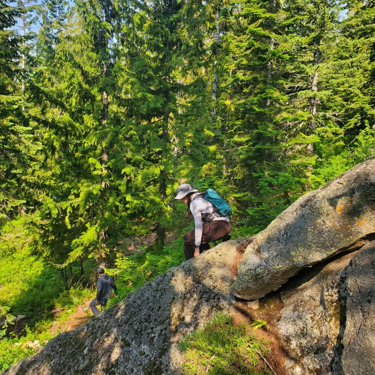 "IMBA Trail Solutions Project Manager Leah Mancabelli scoping a slab during trail design"